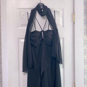 Eureka,Large, black with bling. It is a high low hem line and zips up the back.